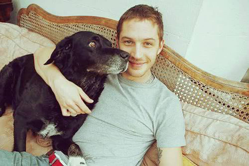 <p>The future star of <em>Mad Max</em> once had a dog named after the character. He’s shared a circa 2006 throwback pic of himself hugging up to the buddy he used to insist on bringing along to acting class. (Photo: <a rel="nofollow noopener" href="https://www.facebook.com/TomHardyUK/photos/a.643638628980503.1073741829.555896884421345/657085090969190/?type=3&theater" target="_blank" data-ylk="slk:Tom Hardy via Facebook;elm:context_link;itc:0;sec:content-canvas" class="link ">Tom Hardy via Facebook</a>)<br><br></p>