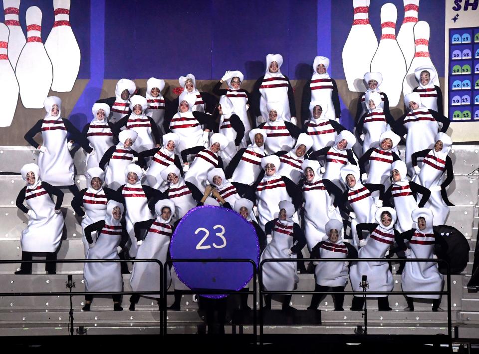 ACU seniors, costumed as bowling pins, perform in the Sing Song rehearsal at ACU’s Moody Coliseum on Thursday.