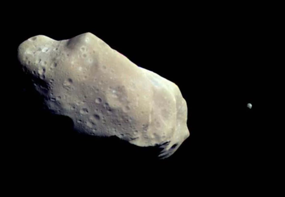 The Galileo spacecraft snapped this image of asteroid 243 Ida and its small moon Dactyl.