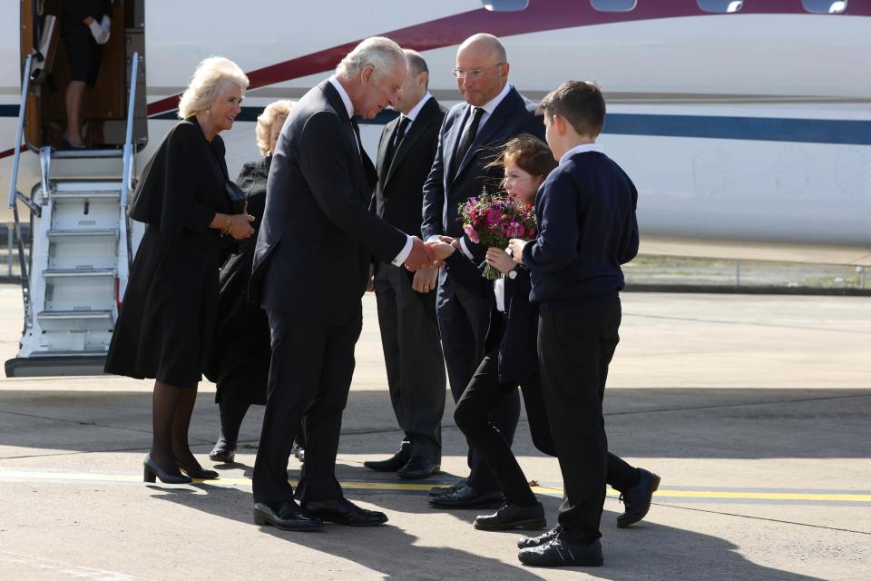 King Charles at Belfast Airport (AP)