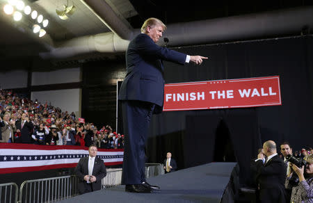 U.S. President Donald Trump gestures to supporters during a campaign rally at El Paso County Coliseum in El Paso, Texas, U.S., February 11, 2019. REUTERS/Leah Millis