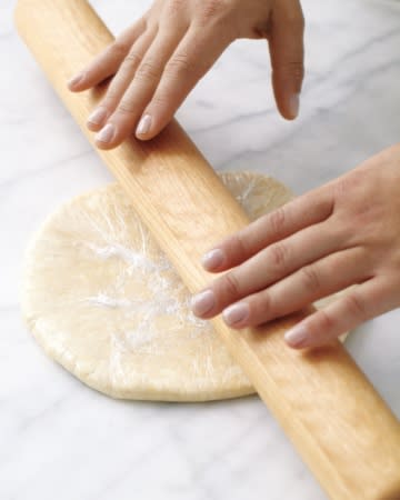 <div class="caption-credit"> Photo by: Martha Stewart Living</div><div class="caption-title">Roll the Dough into Rounds About This Thick</div><b>Roll the Dough into Rounds About This Thick</b> <br> A round that is 1/2 inch thick and 8 inches in diameter -- as opposed to the standard hockey-puck size -- will chill more quickly and soften more uniformly when removed from the refrigerator. <br> <br> Now that you're trained in piecrust making, follow our tips for mastering <a rel="nofollow noopener" href="http://www.marthastewart.com/274216/making-decorative-piecrusts/@center/276949/everything-thanksgiving?xsc=shine_ms_piecrust101" target="_blank" data-ylk="slk:decorative pies;elm:context_link;itc:0;sec:content-canvas" class="link ">decorative pies</a>! <br>