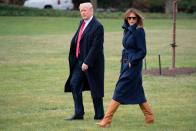 <p>All bundled up in a navy trench on a brisk Washington afternoon in early spring in 2018, Melania accessorized with Tom Ford sunglasses.</p>