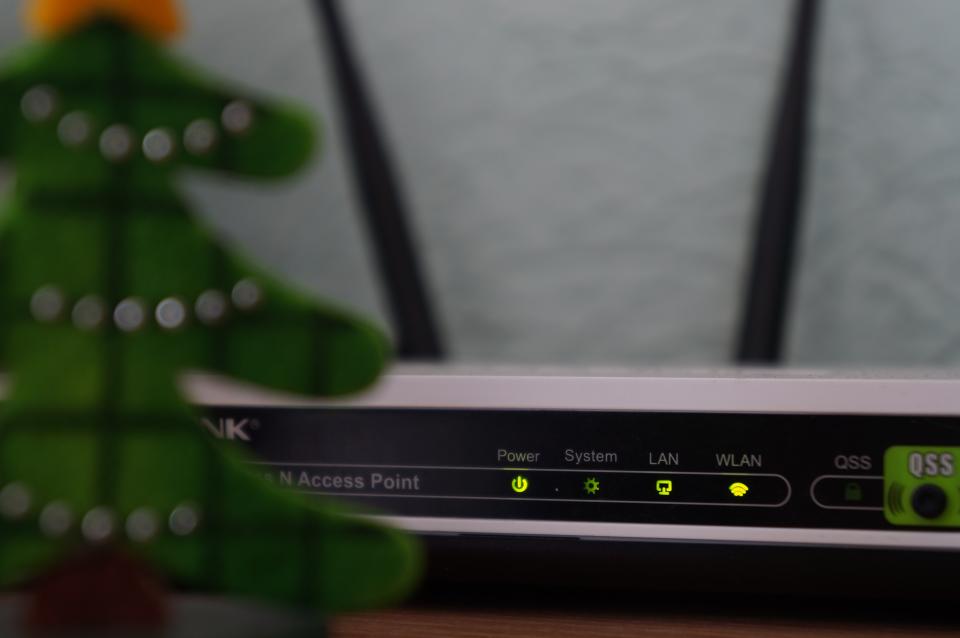 Place your router on a shelf or table and keep it away from other wireless devices for a faster connection. (Misha Feshchak/Unsplash)