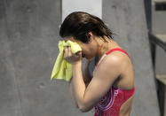 Shi Tingmao of China reacts after winning gold medal in women's diving 3m springboard final at the Tokyo Aquatics Centre at the 2020 Summer Olympics, Sunday, Aug. 1, 2021, in Tokyo, Japan. (AP Photo/Dmitri Lovetsky)