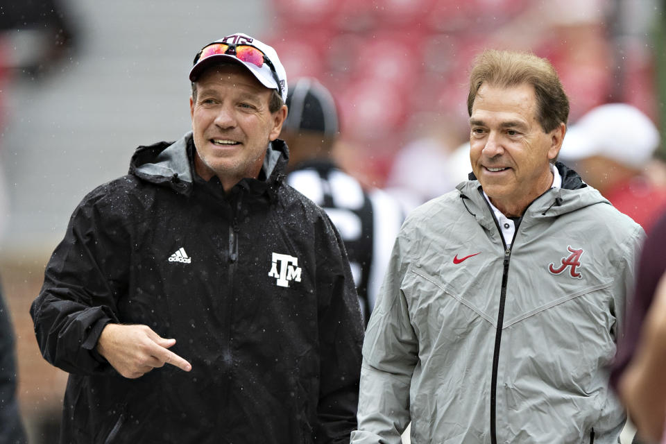 Nick Saban, right, took a shot at Jimbo Fisher and Texas A&M that will reverberate around the world of college football. (Wesley Hitt/Getty Images)