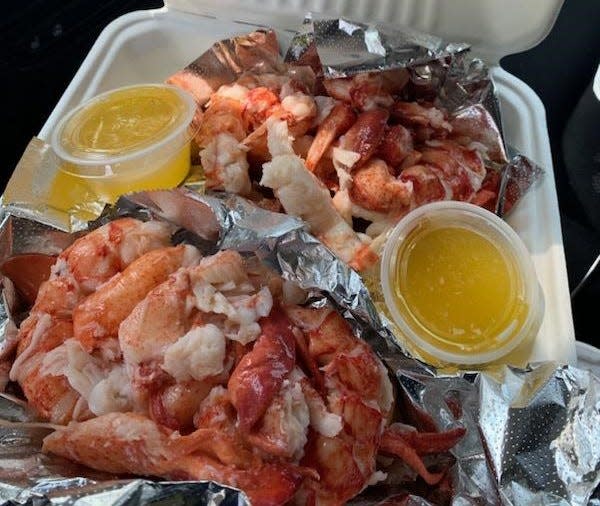 Two of Red's Eats lobster rolls in Maine. All are served to go out of their Route 1 stand that was discovered by the New York Times.