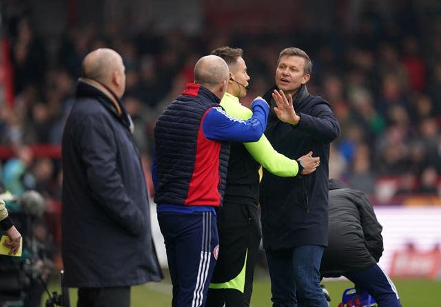 Leeds manager Jesse Marsch argues with Accrington assistant manager Jimmy Bell during the match 