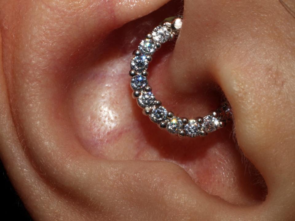 jeweled daith peircing in ear