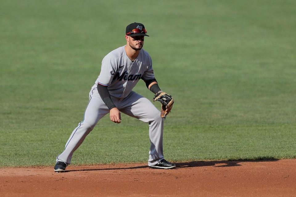 Miami Marlins second baseman Eddy Alvarez waits for a pitch to a Baltimore Orioles batter during the first inning in the first game of a baseball doubleheader, Wednesday, Aug. 5, 2020, in Baltimore. Among the Marlins’ roster replacements following their coronavirus outbreak was infielder Alvarez, a 2014 Olympic silver medalist in speedskating.