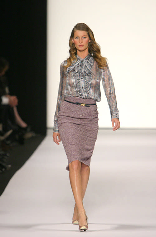 The model wore a floral top and taupe pencil skirt for the Marc Jacobs runway.