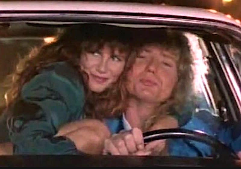A screenshot of Tawny Kitaen and David Coverdale from the 