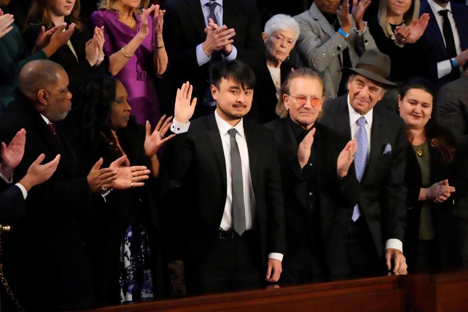 USA; Brandon Tsay waves as he’s acknowledged by President Joe Biden during the State of the Union address from the House chamber of the United States Capitol in Washington.