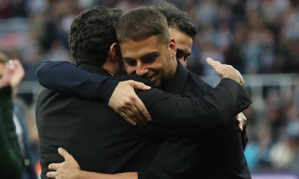 Jamie Reuben embraces Yasir al-Rumayyan on the St James’ Park pitch in May.