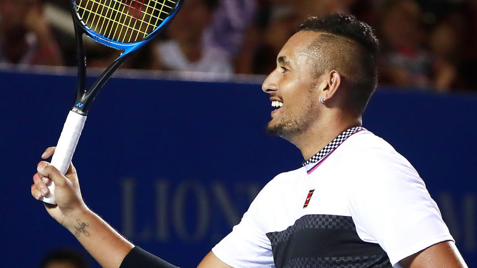 Nick Kyrgios got involved with the crowd’s Mexican wave even though it brought a halt to the match. Pic: Getty
