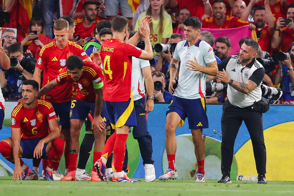 A guard slipped and fell into Álvaro Morata’s legs while chasing after a fan on the field on Tuesday after Spain’s semifinals win over France.