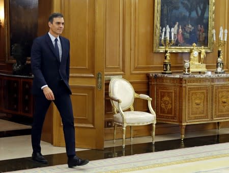 Spain's acting PM Sanchez arrives to meet King Felipe before their meeting in Madrid