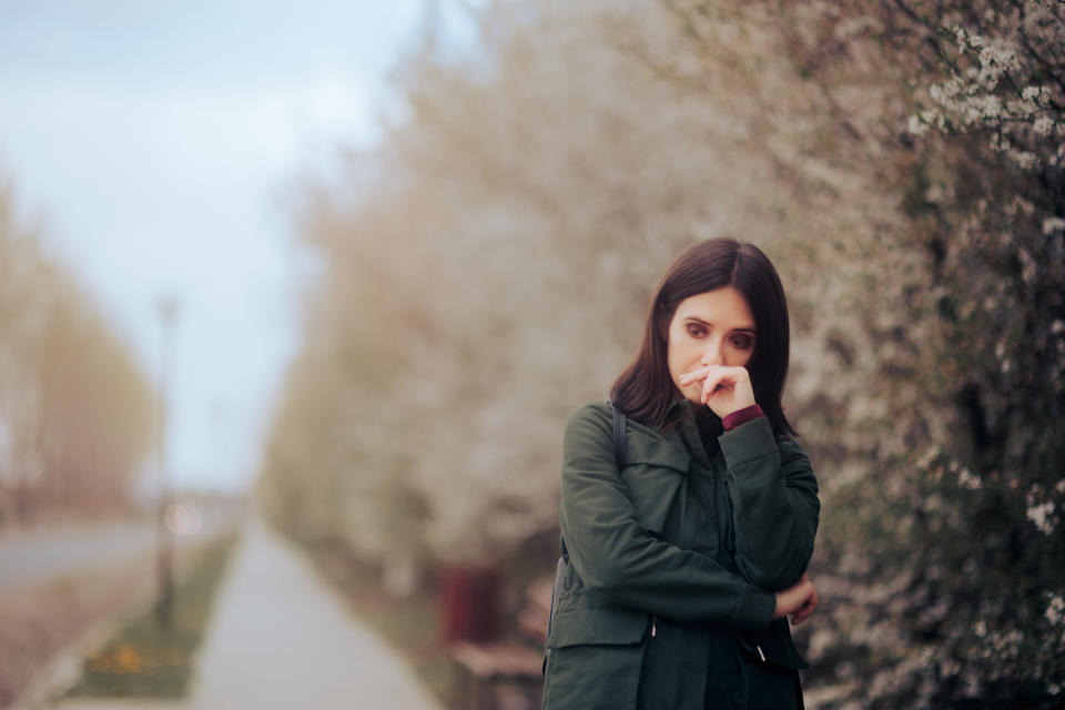 Sad woman with seasonal affective disorder . (Image via Getty Images)