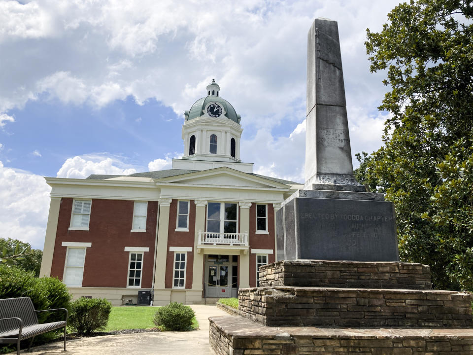 The Stephens County Courthouse and a monument to Confederate soldiers in Toccoa, Ga., is shown on Friday, Sept. 2, 2022. Republicans in Georgia increasingly rely on voters in north Georgia areas including Toccoa as their margins shrink in suburban Atlanta. (AP Photo/Jeff Amy)