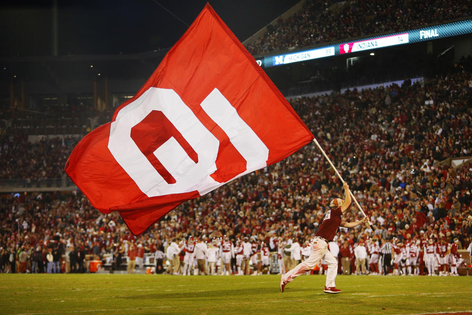 NORMAN, OK - NOVEMBER 23:  A Ruf/Nek parades the Oklahoma Sooners flag around the field after a touchdown against the TCU Horned Frogs on November 23, 2019 at Gaylord Family Oklahoma Memorial Stadium in Norman, Oklahoma.  OU held on to win 28-24.  (Photo by Brian Bahr/Getty Images)