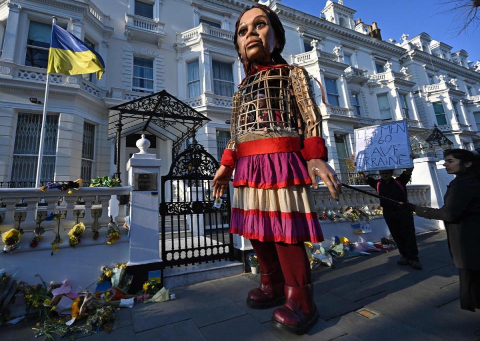 Little Amal, a giant puppet depicting a Syrian refugee girl, arrives at Ukraine's Embassy in London, on March 10, 2022 (Justin Tallis / AFP via Getty Images)
