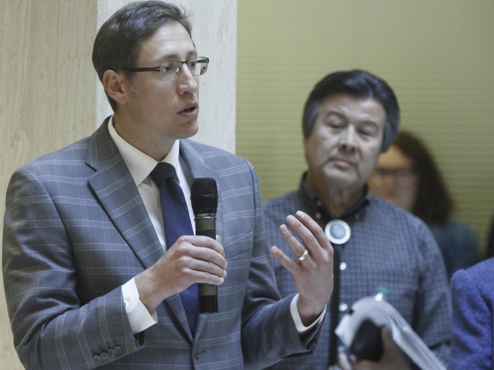 Democratic state Rep. Nathan Small of Las Cruces, New Mexico, speaks in Santa Fe, New Mexico, on Friday, Jan. 5, 2024, about a budget proposal in advance of a 30-day legislative session. The Democratic-led legislature convenes Jan. 16 amid a multibillion-dollar budget surplus to address concerns about education, crime, affordable housing and childhood well-being in an election years for House and Senate lawmakers. Small is the lead House budget negotiator. (AP Photo/Morgan Lee)