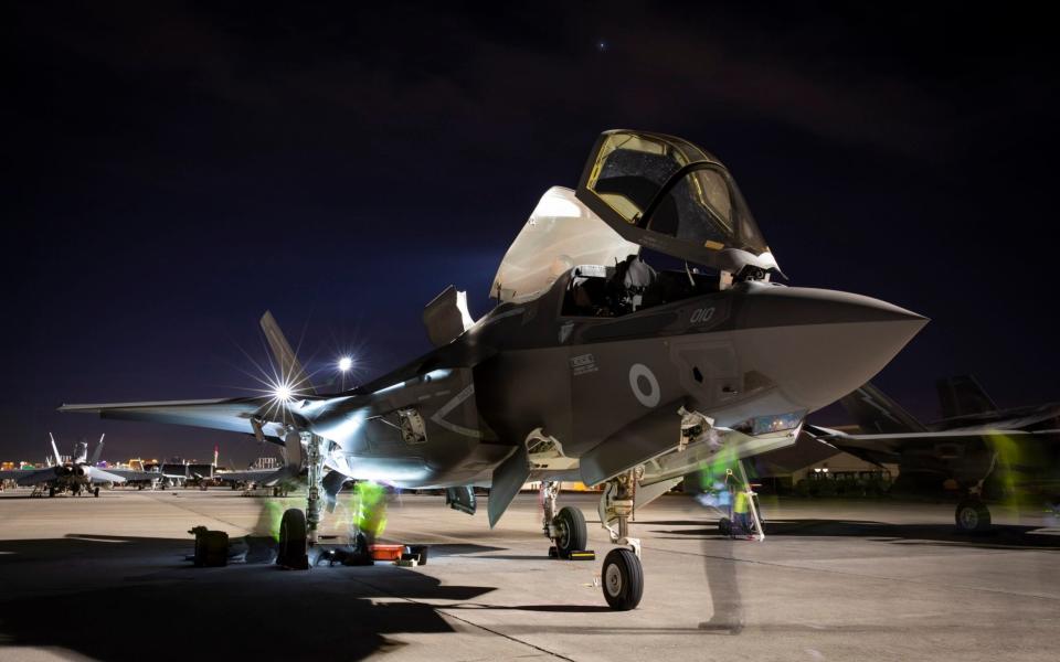 An F-35 Lightning aircraft from 617 Squadron from RAF Marham, undergoing general post flight checks at Nellis Air Force Base in Nevada. British and American F-35 jets will be an integral part of the initial Carrier Strike Group deployment.  - Cpl Amy Lupton RAF