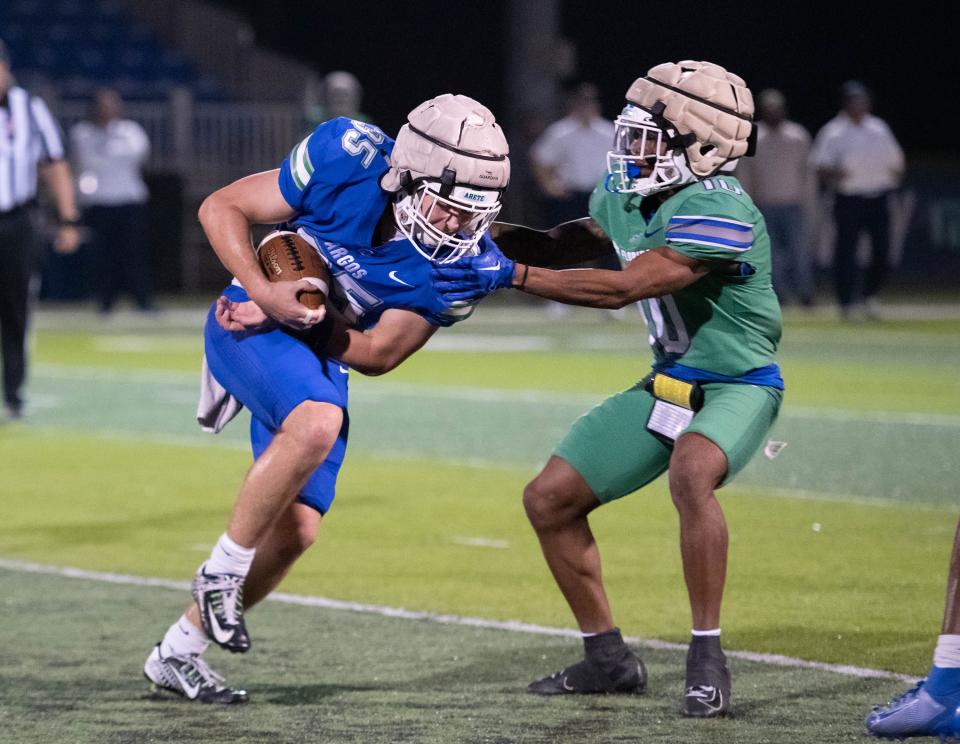 Will Breland (35) intercepts a pass and takes it to the house for a pick six during the spring football game at the University of West Florida in Pensacola on Thursday, March 9, 2023.