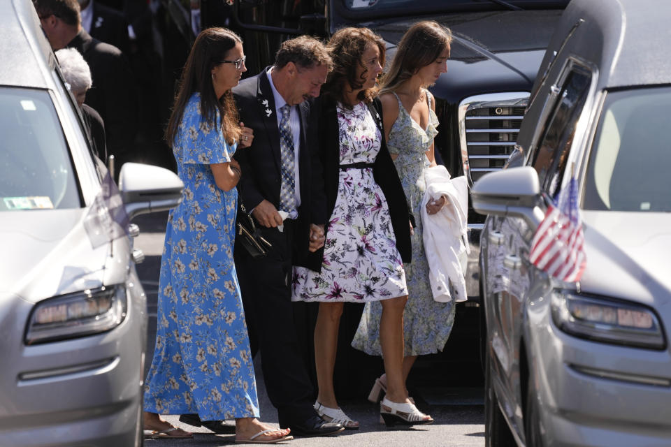 Guy Gaudreau, the father, family and other mourners arrive for a funeral for Columbus Blue Jackets hockey player John Gaudreau Gaudreau and his brother Matthew Gaudreau at St. Mary Magdalen Catholic Church in Media, Pa., Monday, Sept. 9, 2024. (AP Photo/Matt Rourke)