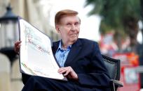 FILE PHOTO: Executive Chairman of Viacom and CBS Corporation Redstone holds a proclamation to his name in Hollywood