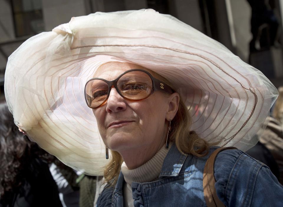 A woman smiles during the annual Easter Bonnet Parade in New York