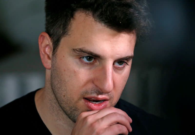 FILE PHOTO: FILE PHOTO: Co-founder and CEO of Airbnb Brian Chesky speaks during an interview in Langa township, Cape Town