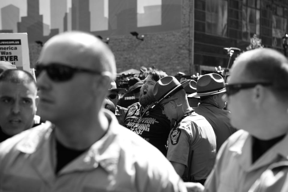 <p>Police detain a protester outside of the convention center. (Photo: Khue Bui for Yahoo News)<br></p>