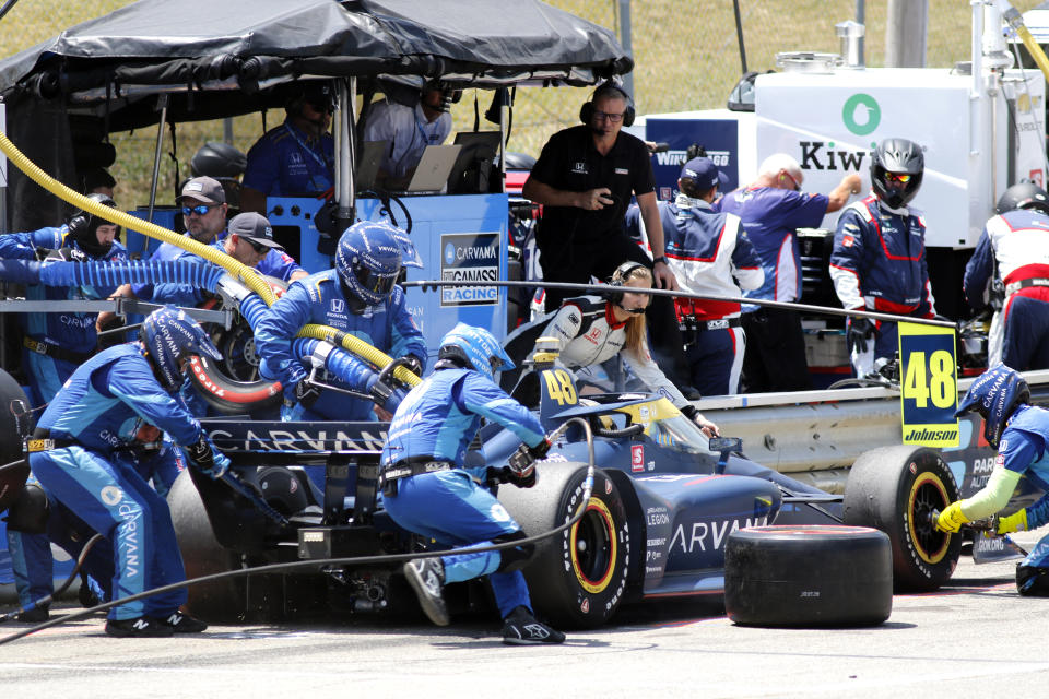 Jimmie Johnson makes a pit stop during an IndyCar auto race at Mid-Ohio Sports Car Course in Lexington, Ohio, Sunday, July 3, 2022. (AP Photo/Tom E. Puskar)