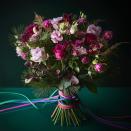 <p>Alternatively, ditch traditional festive reds and welcome shades of pink with this Christmas bouquet. Here, burgundy cymbidium orchids are combined with premium red lilac and cerise roses, soft gold asparagus fern and scented foliages.</p>