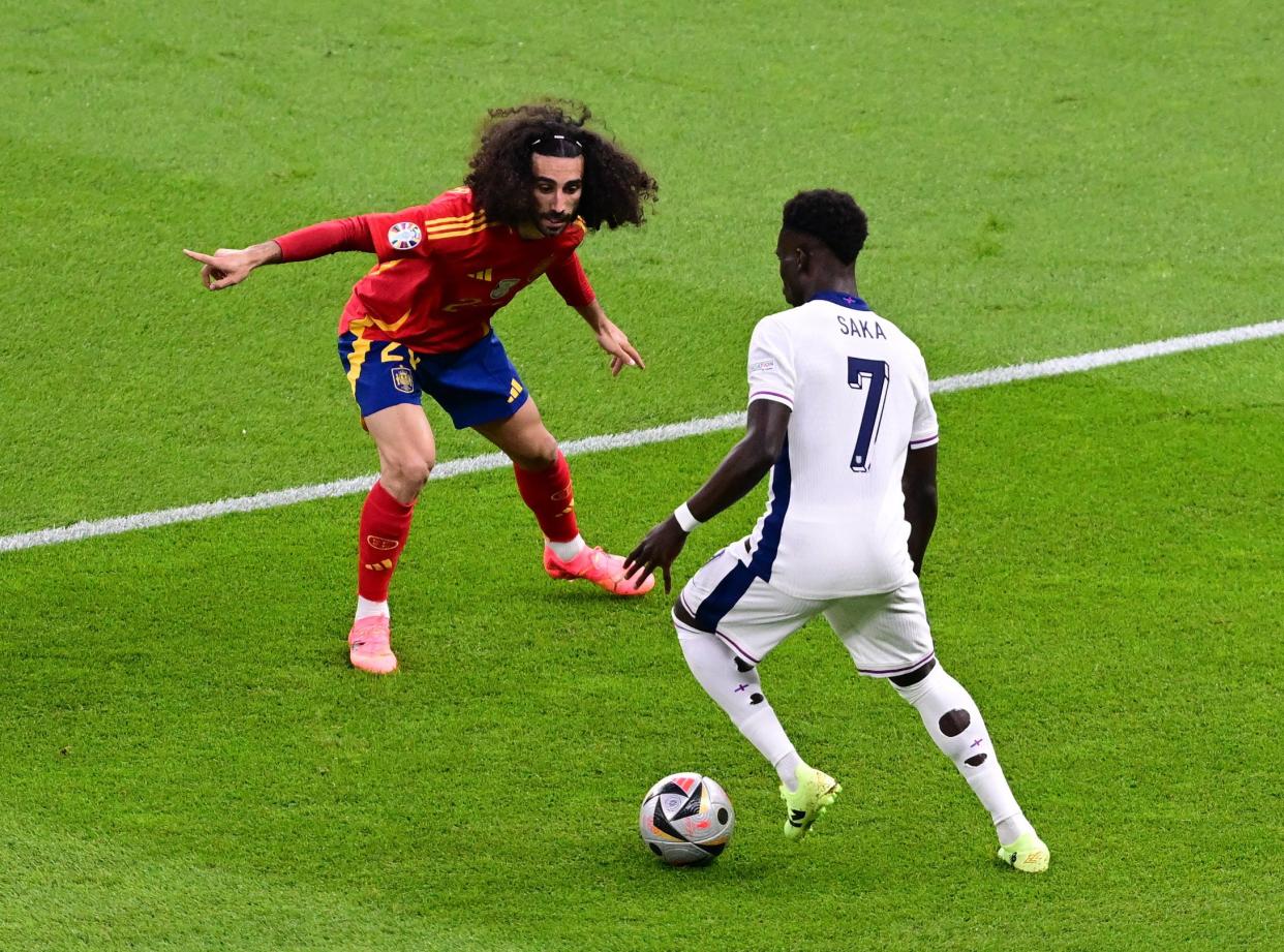 Bukayo Saka faces up to Marc Cucurella (Reuters)