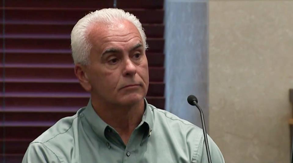 George Anthony is seen testifying on the stand during his daughter's trial.