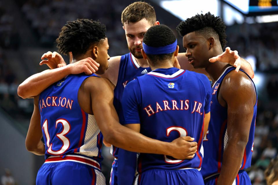 WACO, TX - MARCH 2: The Kansas Jayhawks huddle up before a free throw as Kansas takes on the Baylor Bears in the second half at Foster Pavilion on March 2, 2024 in Waco, Texas. (Photo by Ron Jenkins/Getty Images)