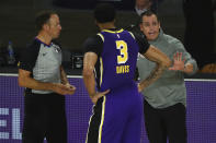 Los Angeles Lakers coach Frank Vogel talks with forward Anthony Davis (3) during the second quarter of the team's NBA basketball game against the Indiana Pacers on Saturday, Aug. 8, 2020, in Lake Buena Vista, Fla. (Kim Klement/Pool Photo via AP)