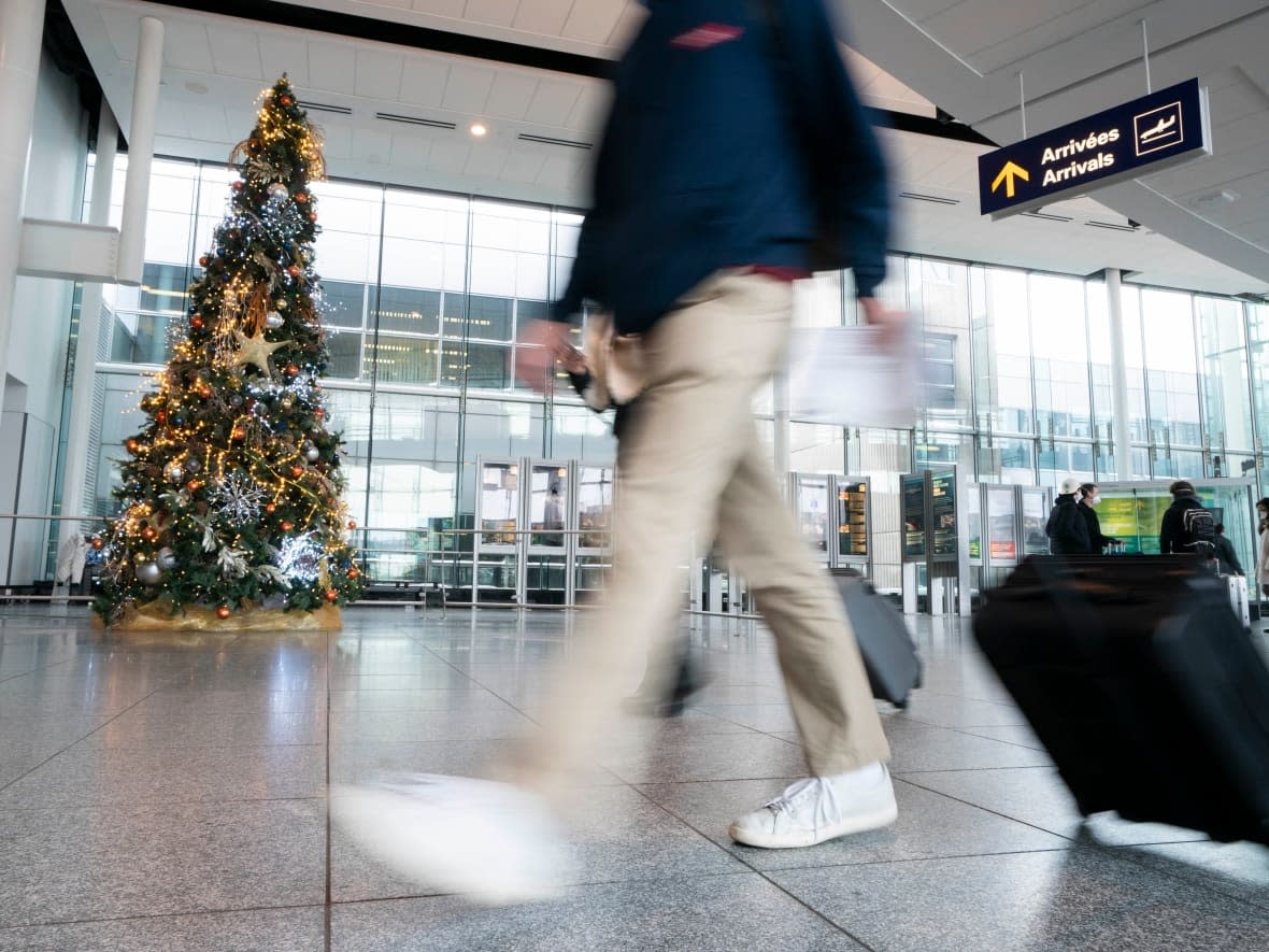 Travel levels aren't quite back to pre-pandemic levels, but they're getting pretty close. And the holidays are always one of the busiest times of the year.  (Ivanoh Demers/CBC-Radio-Canada - image credit)