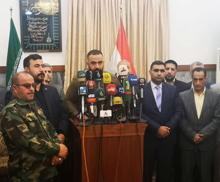 A spokesman for the Fateh coalition speaks during a statement at the home of Iran's consul-general in the holy city of Najaf, Iraq April, 13, 2019. REUTERS/Stringer