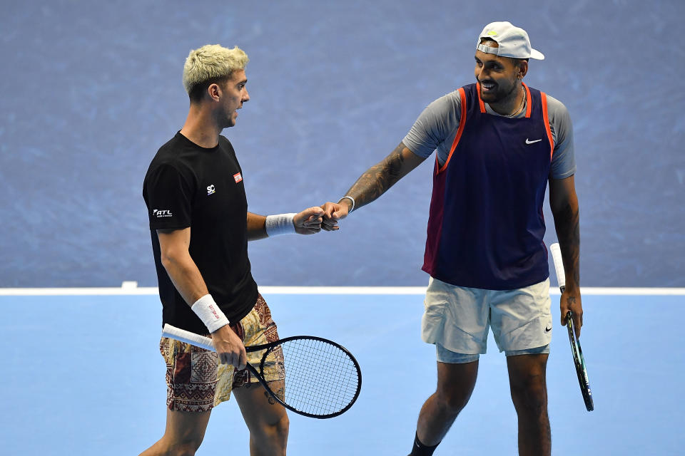 Seen here, Aussie pair Thanasi Kokkinakis and Nick Kyrgios celebrate a point while playing doubles together at the ATP Finals in Turin. 