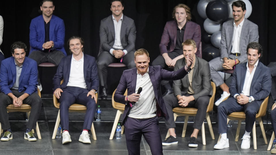 Lawson Crouse of the new Utah NHL hockey team speaks as the team is introduced during a welcome event Wednesday, April 24, 2024, in Salt Lake City. (AP Photo/Rick Bowmer)