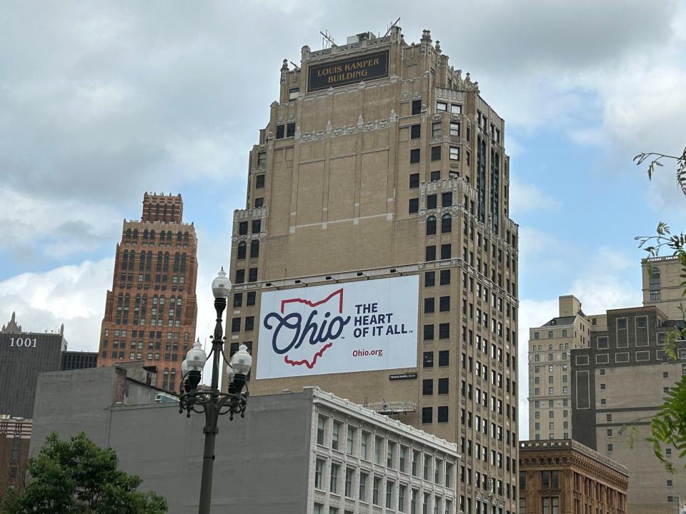 Ohio tourism signs have sprung up in Detroit. This sign is on the Louis Kamper Building, now the Kamper Stevens Apartments, on Washington Blvd., photographed on Saturday, May 20.