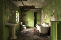 <p>Roman Robroek, 30, a Dutch photographer, traveled all over France to capture the beauty of these decaying buildings. (Photo: Roman Robroek/Caters News) </p>