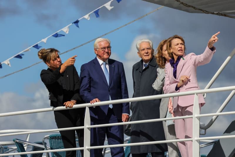 (L-R) Mona Neubaur, Minister of Economic Affairs, Industry, Climate Protection and Energy of the State of North Rhine-Westphalia, German President Frank-Walter Steinmeier, Italian President Sergio Mattarella, Laura Mattarella and Elke Buedenbender stand on board a ship during the state visit. Christoph Reichwein/dpa