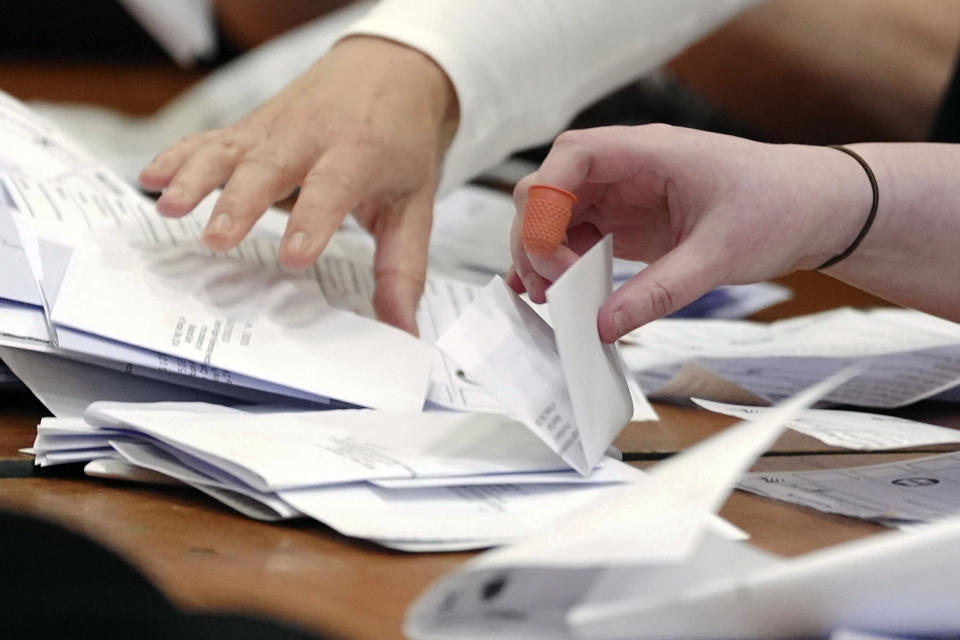 Counting begins at the Blackpool South by-election at Blackpool Sports Centre in Blackpool, England, Thursday, May 2, 2024. The by-election was triggered after the resignation of Scott Benton. (Peter Byrne/PA via AP)