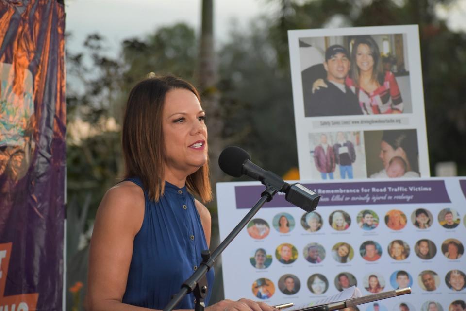 Melissa Wandall speaks during World Day of Remembrance for Road Traffic Victims on Friday, Nov. 17, 2023, at the same intersection where her husband, Mark, was killed in a Bradenton crash 20 year ago.
