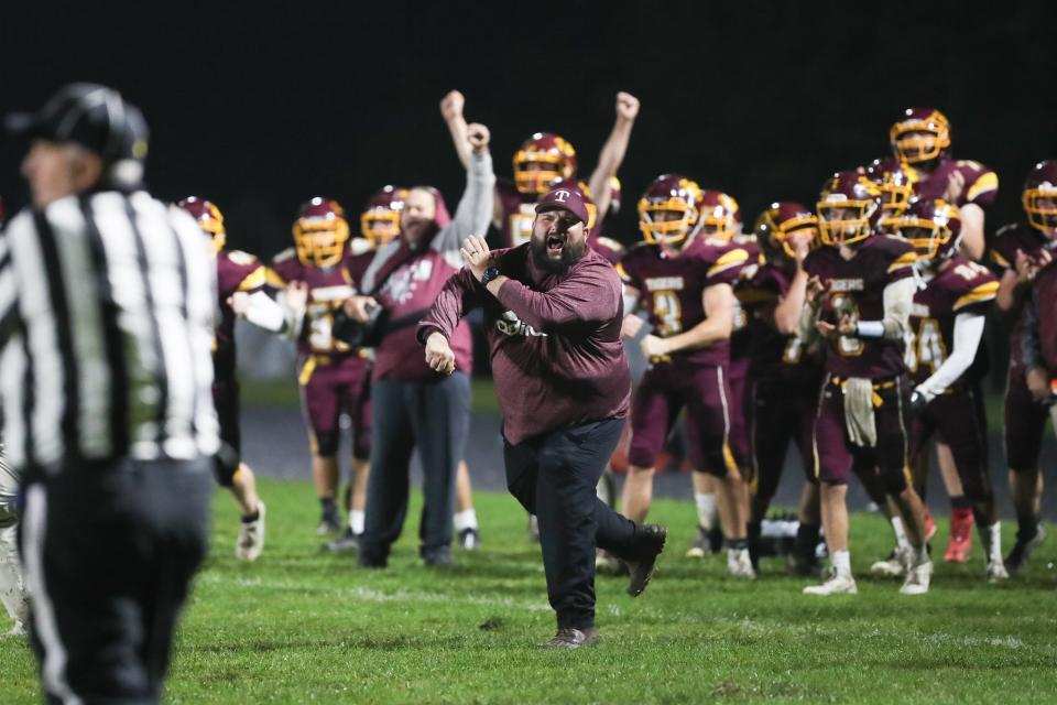 The Tiverton bench celebrates. Tiverton squeezed out a 7-6 win over Smithfield High School on a recent Friday night at Tiverton High School.