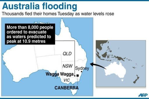 Hundreds more people were evacuated Wednesday in Australia's flood-hit southeast, as residents of sodden Wagga Wagga breathed a sigh of relief after a levee on the swollen Murrumbidgee River held firm